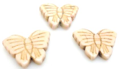 Howlit kremowy - motyl 25x20mm