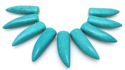 Howlit - kieł 30x10mm - turkusowy