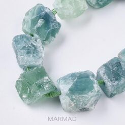 Fluoryt - surowe kamienie- z otworem