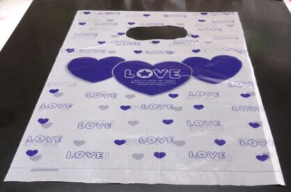 Opakowanie ozdobne 250x200mm - białe w fioletowe serduszka